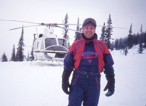 Dr. Sheldon Katz in front of a helicopter