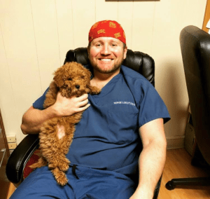 Dr. Serge Lokot with his dog Charlie